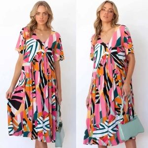 SundayUp Boutique Tropical Print Dipped Hem Dress